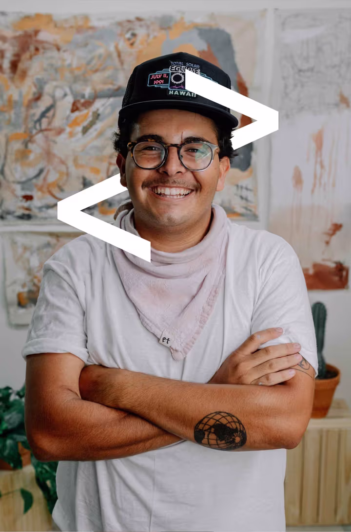 Man happy and proud about his paintings