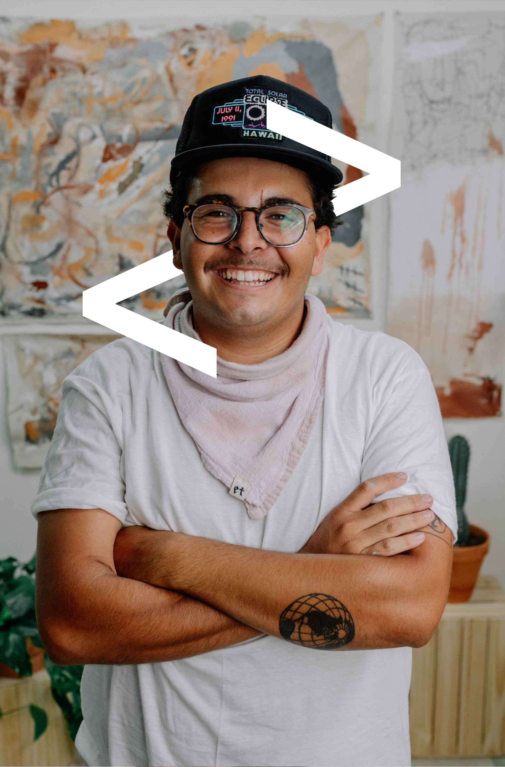 Man happy and proud about his paintings